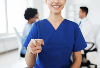 Image showing close up of nurse pointing on you at hospital