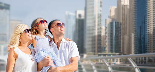 Image showing happy family over dubai city street background