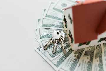 Image showing close up of home model, money and house keys