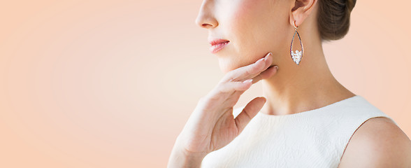 Image showing close up of beautiful woman face with earring