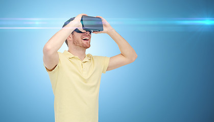 Image showing happy man in virtual reality headset or 3d glasses