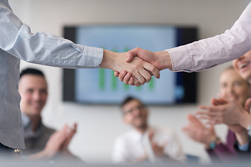 Image showing business womans handshake