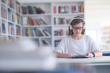 Image showing female student study in library