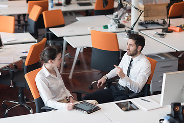 Image showing business couple working together on project