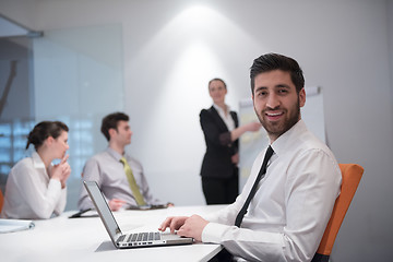 Image showing young business man at meeting