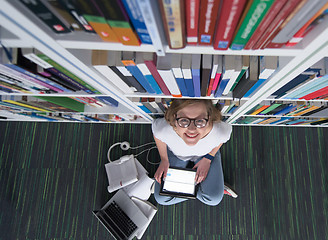 Image showing female student study in library