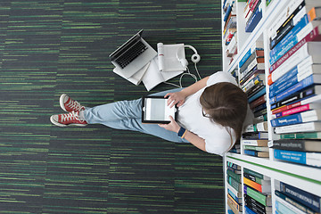 Image showing female student study in library