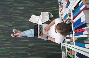 Image showing female student study in library