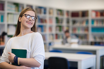 Image showing portrait of female student in library