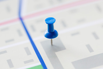 Image showing close up of map or city plan with pin