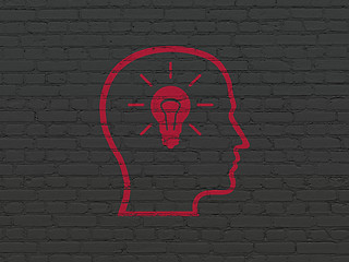 Image showing Business concept: Head With Lightbulb on wall background