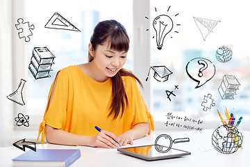 Image showing asian woman student with tablet pc at home