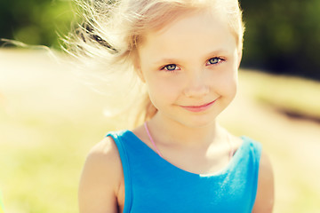 Image showing happy little girl outdoors at summer