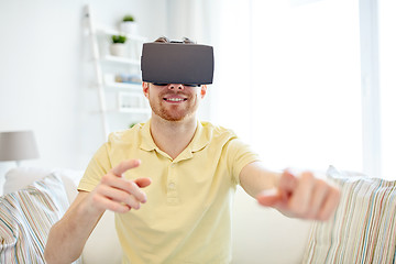 Image showing young man in virtual reality headset or 3d glasses