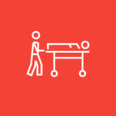 Image showing Man pushing stretchers line icon.