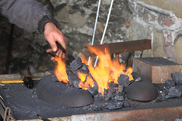 Image showing old smithery and fire