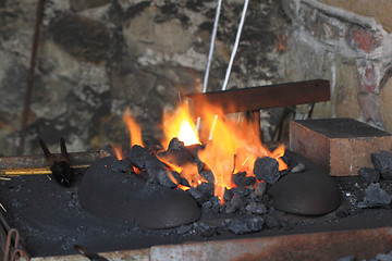 Image showing old smithery and fire