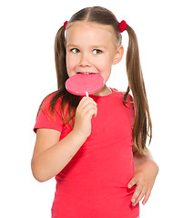 Image showing Little girl with lollipop