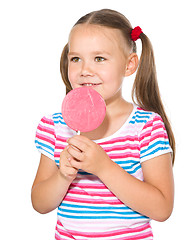 Image showing Little girl with lollipop