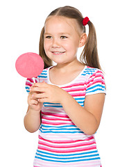 Image showing Little girl with lollipop