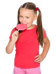 Image showing Little girl with lollipop