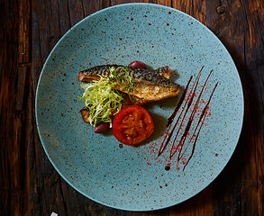 Image showing Fish dish - fried fish and vegetables