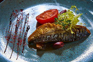 Image showing Fish dish - fried fish and vegetables