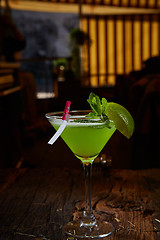 Image showing Martini glass with green cocktail