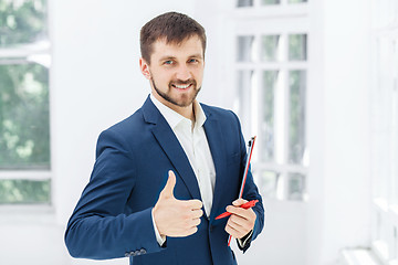 Image showing The smiling male office worker