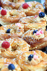 Image showing cream puff with raspberries and blueberries