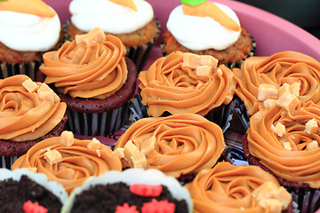 Image showing caramel cupcakes background