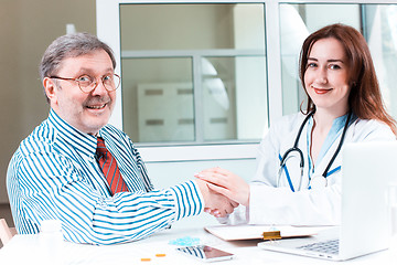 Image showing The patient and his doctor in medical office