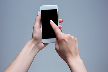 Image showing Closeup shot of a woman typing on mobile phone 