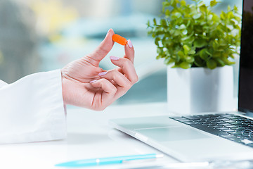 Image showing The doctor with pill in hospital