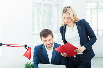 Image showing Male and female office workers.