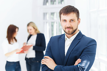 Image showing Male and female office workers.