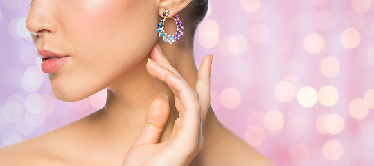 Image showing close up of beautiful woman face with earring