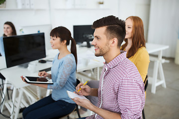 Image showing creative team on conference or seminar at office