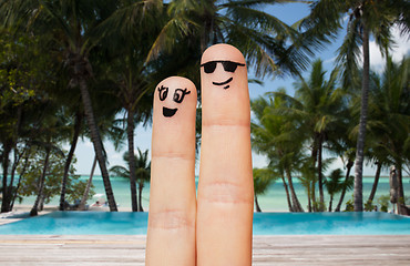 Image showing close up of two fingers with smiley faces