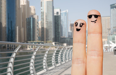 Image showing close up of two fingers with smiley faces