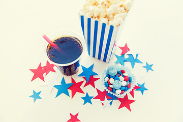 Image showing cola and popcorn with candies on independence day