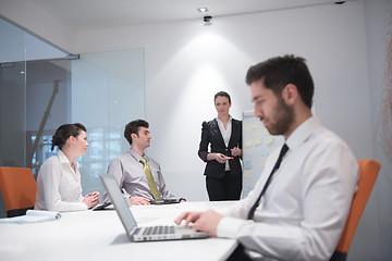 Image showing young business man at meeting