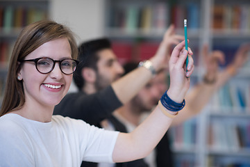 Image showing group of students  raise hands up