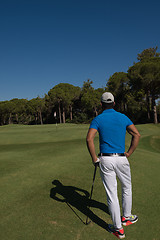 Image showing golf player portrait from back