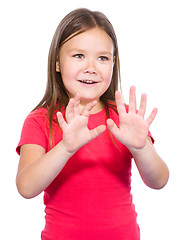 Image showing Portrait of a little girl making stop gesture