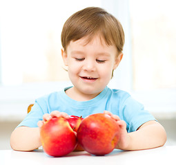 Image showing Portrait of a happy little boy with apples