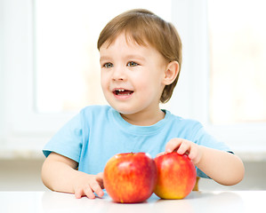 Image showing Portrait of a happy little boy with apples