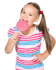 Image showing Little girl with lollipop