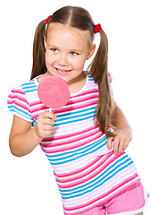 Image showing Little girl with lollipop