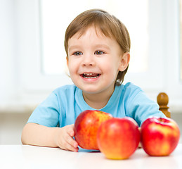 Image showing Portrait of a happy little boy with apples